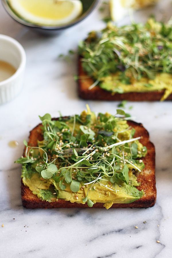 Avocado toasts with micro greens + sesame