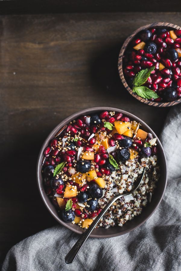 Coconut Quinoa Porridge with Berries and Quinoa Crunch Topping