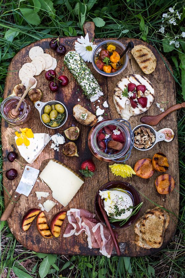 How to make a Killer Summer Cheeseboard (with pickled strawberries + Herb Roasted Cherry Tomatoes!