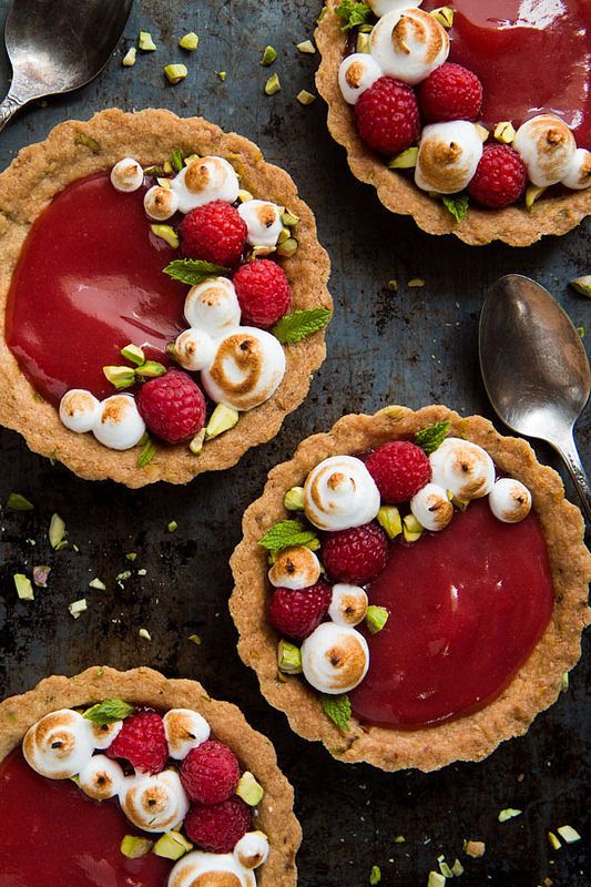 Individual Rhubarb Tarts With Pistachios, Berries, & Shortbread Crust