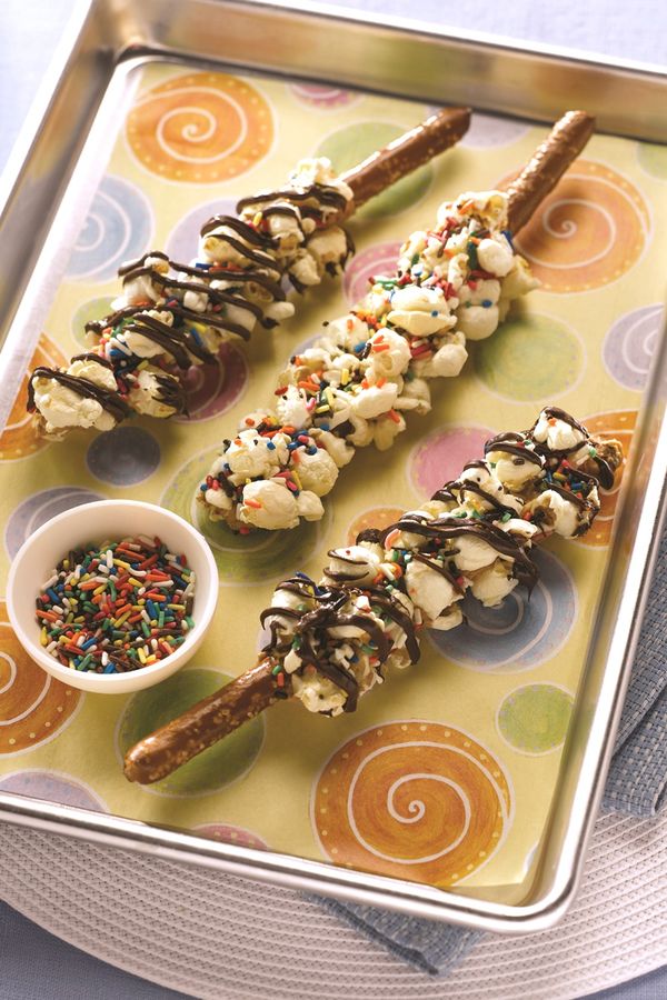 Nutty Popcorn Pretzel Sticks with Chocolate Drizzle