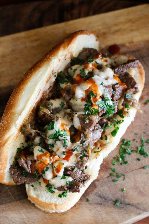 Sirloin Steak Tip Sandwich with Dubliner Cheese Sauce and Caramelized Onions