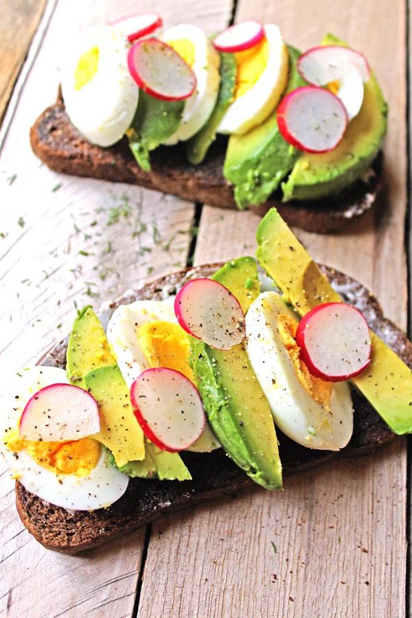 Smorrebrod with egg, avocado, and radish