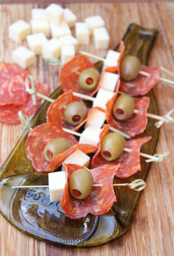 Antipasto skewers with salami, olives and mozzarella