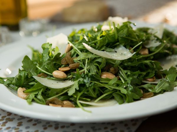 Arugula Salad with White Truffle Oil, Marcona Almonds and Shaved Parmesan