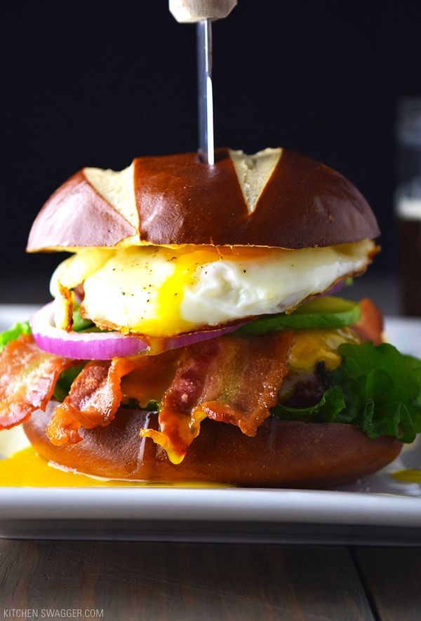 Bacon, Egg, and Avocado Cheeseburger on a Pretzel Bun