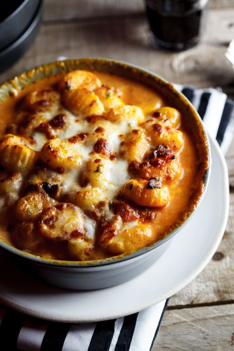 Baked gnocchi with bacon, tomato and mozzarella