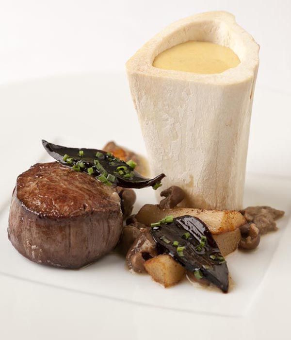 Beef fillet with marrow bones, oyster sabayon and girolle mushrooms