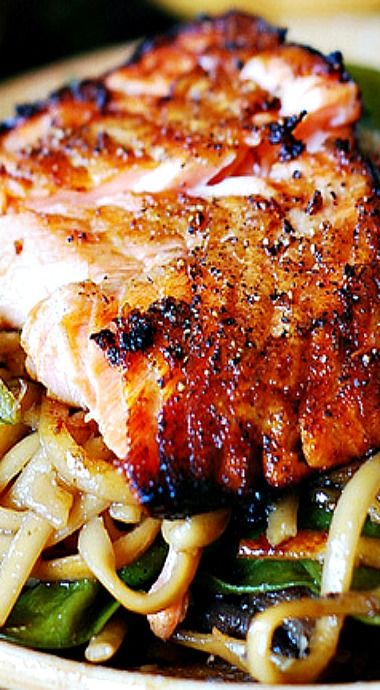 Crispy Asian salmon with stir-fried noodles, pak choi & sugar snap peas