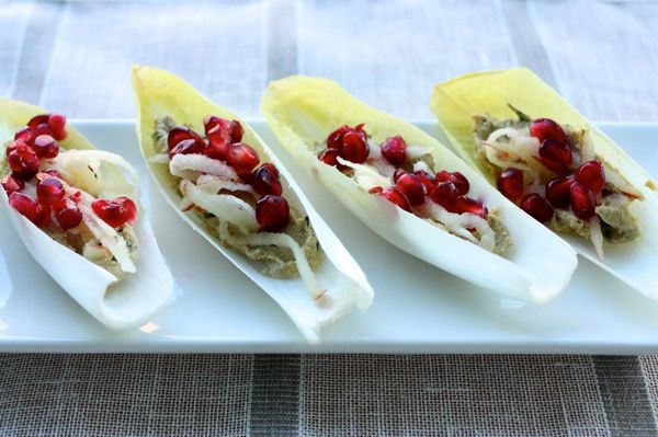 Easy Raw, Vegan Appetizer: Endive Boats with Rosemary Cashew Cheese, Shaved Apple, and Pomegranate Seeds