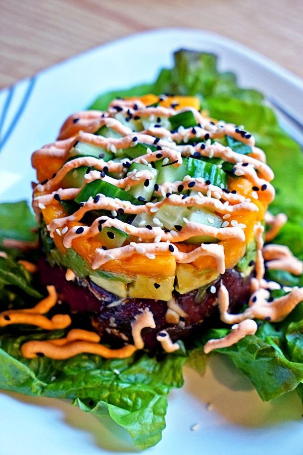 Fresh Ahi Poke Stack with Papaya Avocado and Sriracha Whipped Cream Drizzle