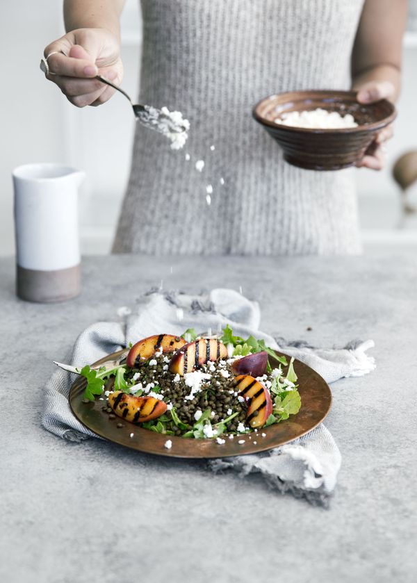 Green Lentil Salad with Grilled Peaches, Goat Cheese, + Rosé Vinaigrette