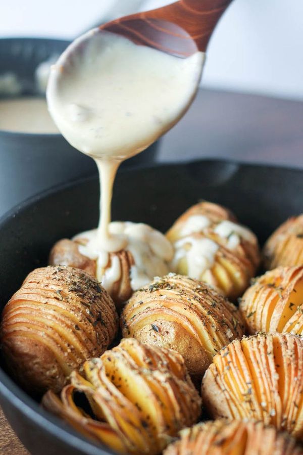 Hasselback Potatoes with Roasted Garlic & Smoked Gouda Sauce