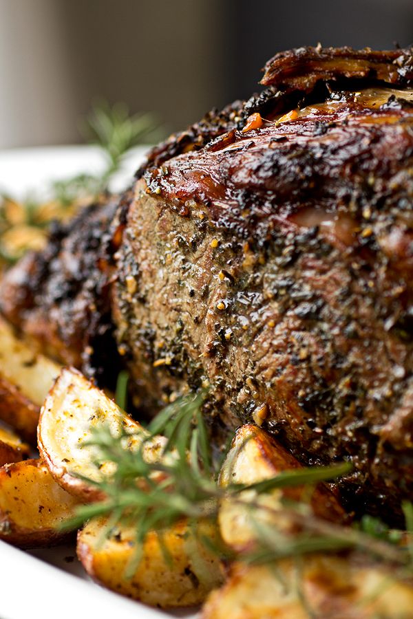 Herb Crusted, Garlic-Stuffed Prime Rib Roast with Creamy Dijon-Horseradish Sauce and Au Jus