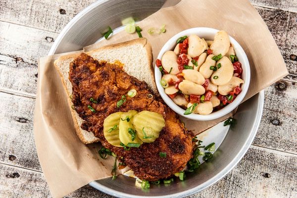 Nashville Hot Fried Chicken with butter beans, Texas toast, and pickles