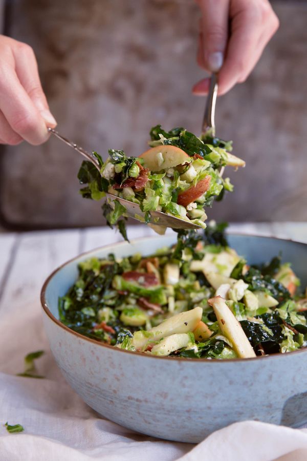 Shredded Brussels Sprouts & Kale Salad with Apple, Gorgonzola & Candied Pecans