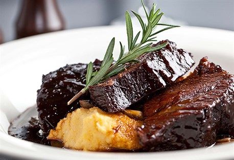 Slow-roasted beef cheeks with soft polenta and port jus