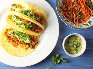 Smashed chipotle chickpea tacos with carrot slaw and avocado crema