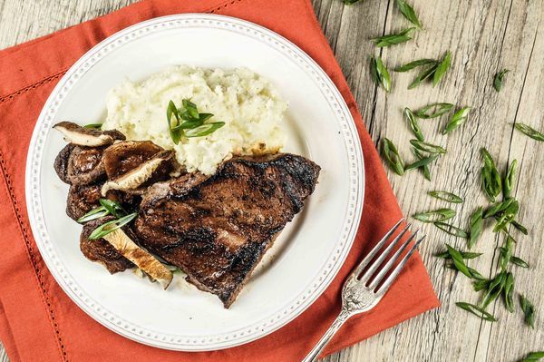 Teriyaki- and Sriracha-Marinated Flat-Iron Steak With Wasabi Whipped Potatoes and Roasted Shiitake Mushrooms