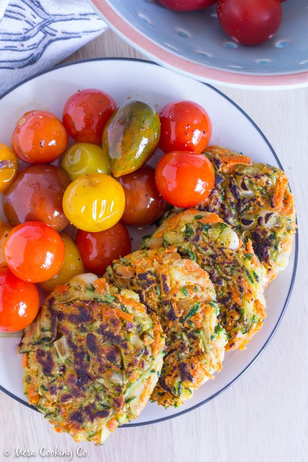 Vegan Zucchini Carrot Fritters with Pan-Roasted Cherry Tomatoes