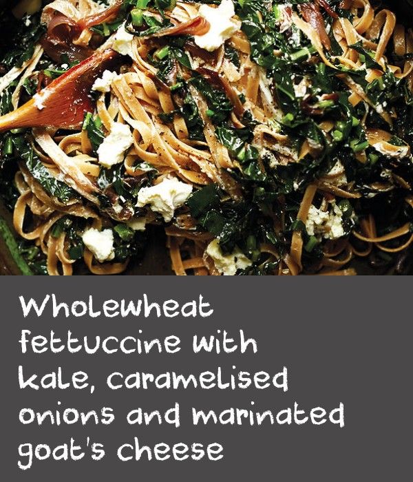 Wholewheat fettuccine with kale, caramelised onions and marinated goat’s cheese