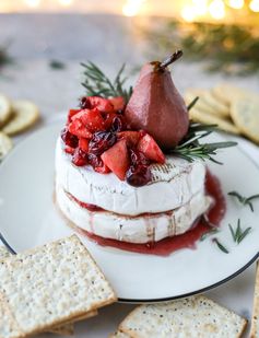 Caramelized Winter Fruit Stuffed Brie Cheese with a Pinot Poached Pear