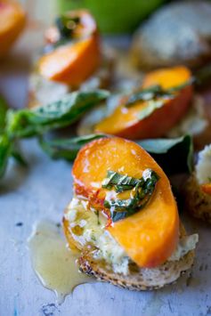 Peach Bruschetta with goat cheese, basil and infused honey