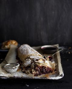 Boozy cherry and christmas pudding strudel with chocolate