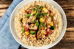 Healthy Takeout Sweet and Sour Chicken with brown rice and green bell pepper