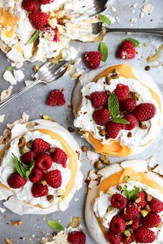 Pistachio Pavlovas with Papaya Curd and Fresh Raspberries