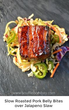 Slow Roasted Pork Belly Bites over Jalapeno Slaw