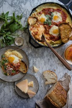 Tomato-braised eggs and creamy baked polenta