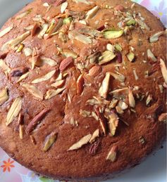 Eggless Wholewheat And Orange Almond Cake