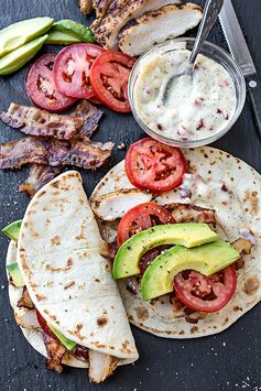 Smokey Chicken Flatbread with Crispy Bacon, Avocado, and Sun-Dried Tomato Mayo