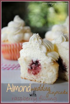 Almond Wedding Cake Cupcakes with Raspberry Filling