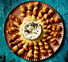 Baked Camembert with bacon-wrapped breadsticks