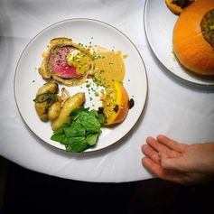 Beef Wellington with Roasted Potatoes and Wilted Greens