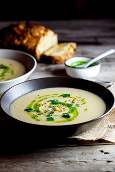 Celeriac & roasted garlic soup with parsley oil