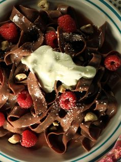 Chocolate Pasta with Chocolate Hazelnut Cream Sauce, White Chocolate Shavings and Fresh Berries