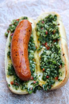 Choripan or chorizo hot dog with chimichurri sauce