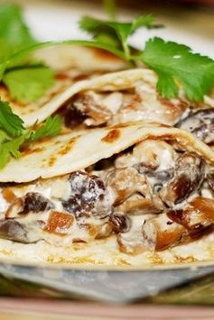 Crepes with creamy chicken and mushroom filling