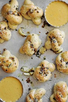 Garlic Knots with Beer Cheddar Sauce