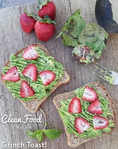 Grinch Toast – Ezekiel Bread with Avocado, Strawberries, & Chia Seeds