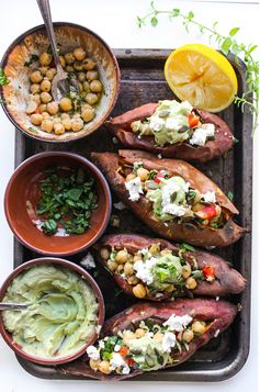 Mediterranean Stuffed Sweet Potatoes with Chickpeas & Avocado Tahini