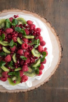 Pavlova with Kiwi, Raspberry, Pomegranate and Mint