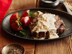 Rib Eye Steak with Onion Blue Cheese Sauce