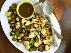 Roasted Cauliflower, Brussels Sprouts and Leeks with Spicy Drizzle