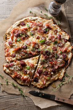 Rustic Pizza with Ham, Grapes, Shallots, Cheese, Honey & Thyme