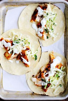 Spicy Fish Tacos with Cabbage Slaw + Lime Crema