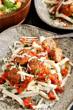 Spicy Italian Sausage Meatballs over Egg Noodles